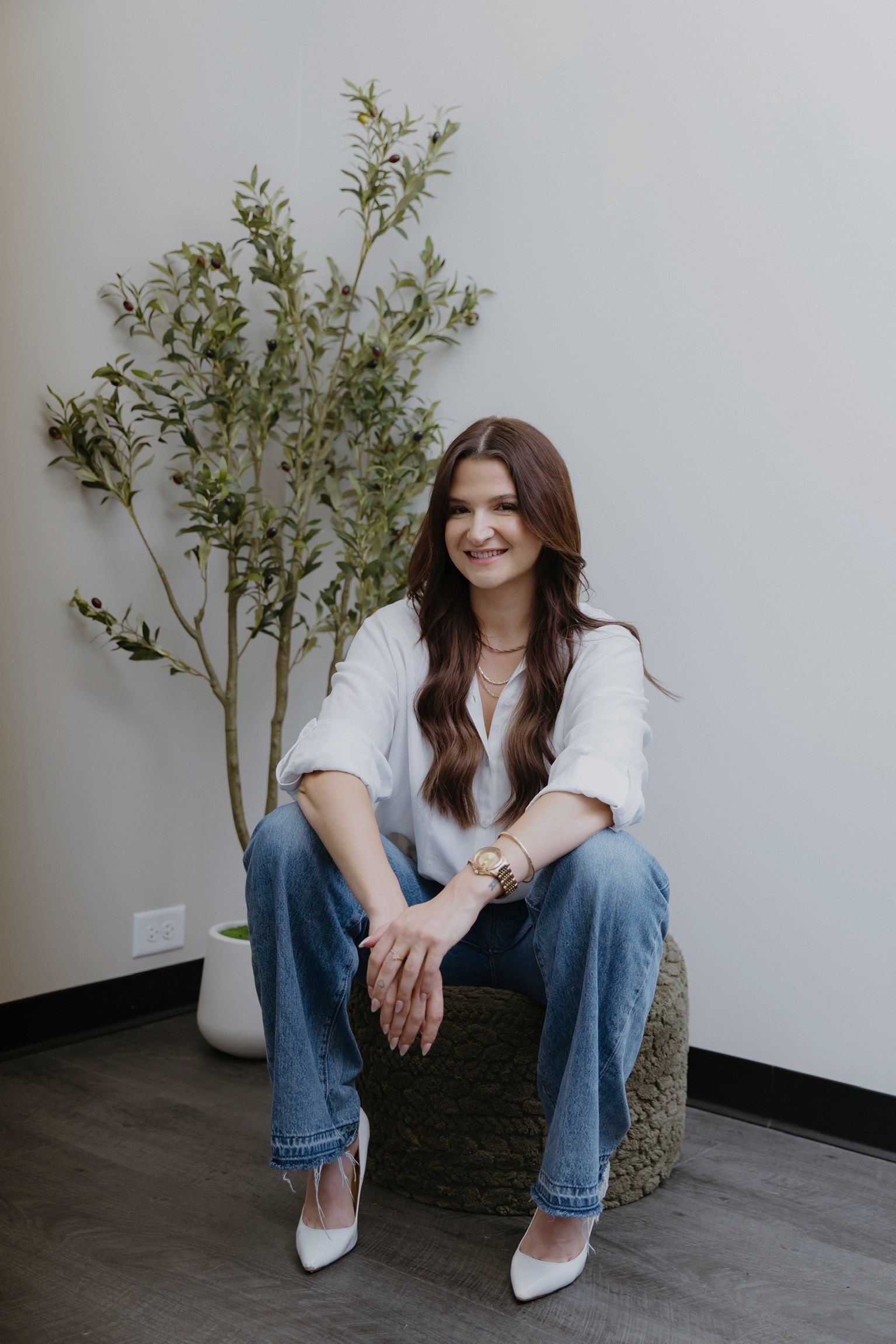 Megan Hudgin smiling in her studio