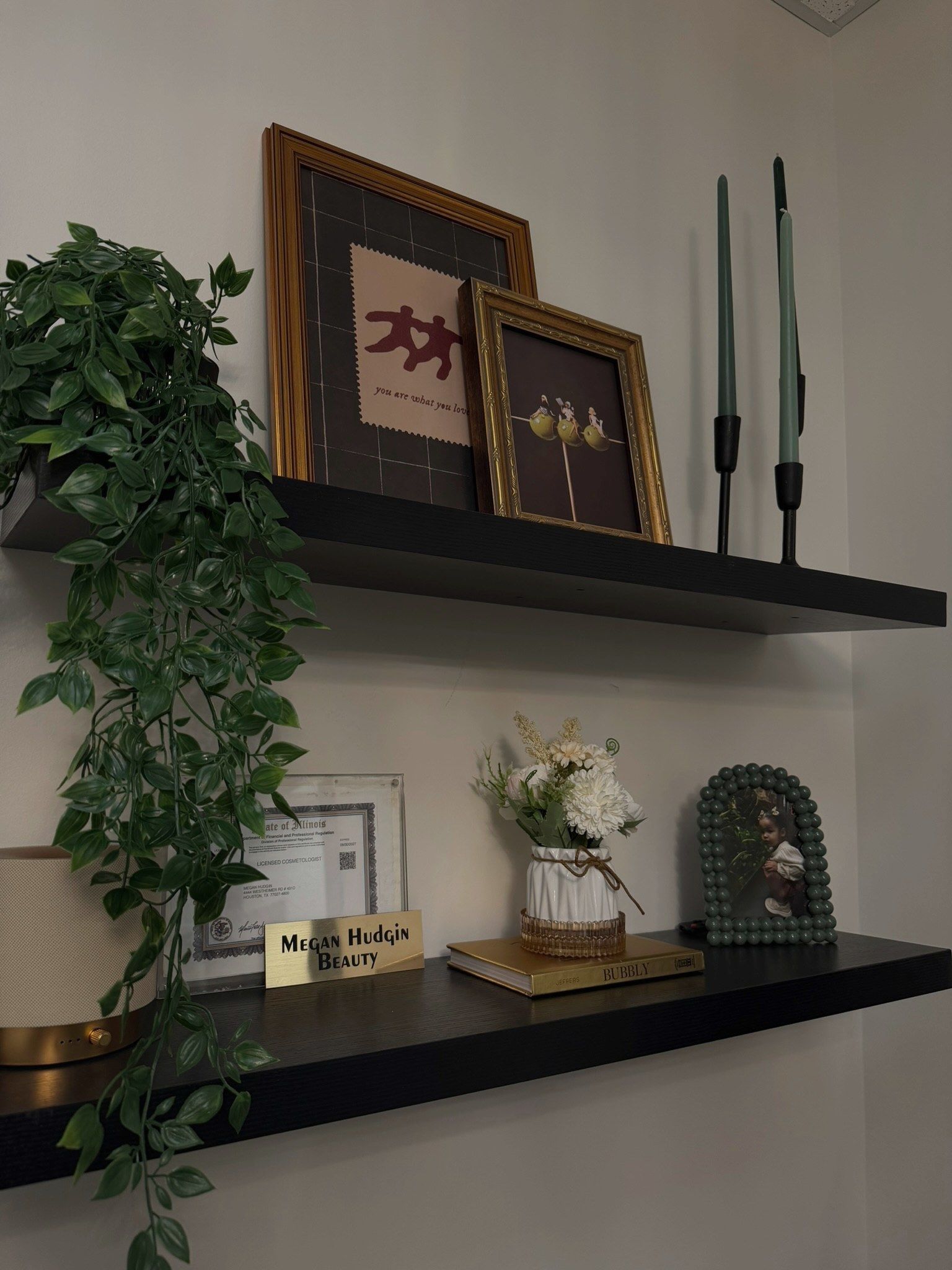 Shelves inside Megan’s studio at Sola Salon Studios